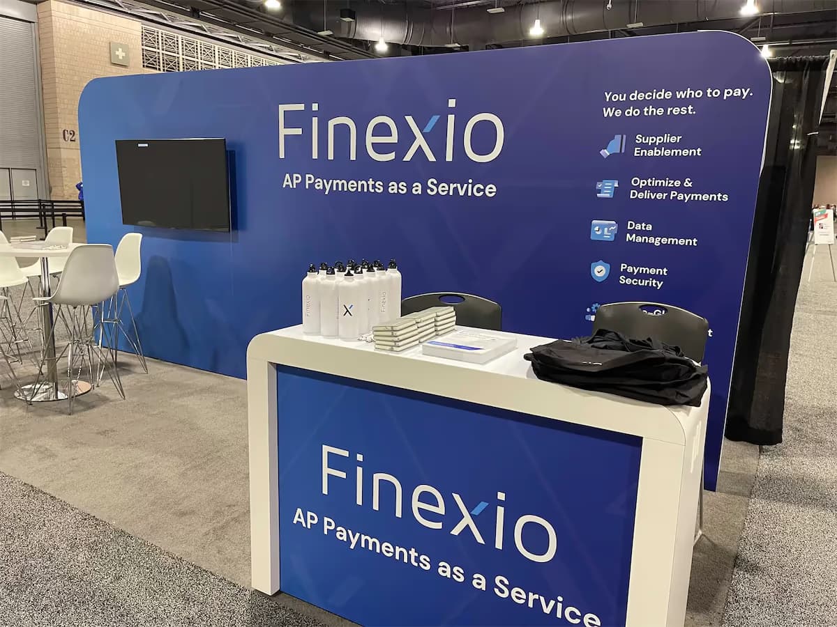 Finexio AP Payments as a Service booth at an industry conference